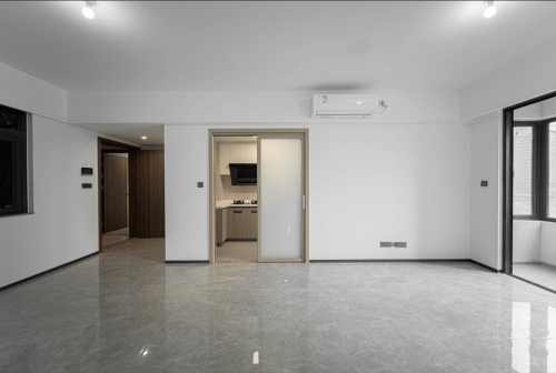 The flat’s living room area and bedrooms are designed with practicality and functionality in mind