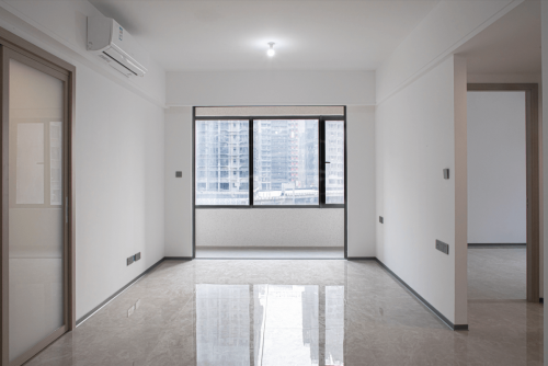 A balcony in the living room area and one in the kitchen for natural light.